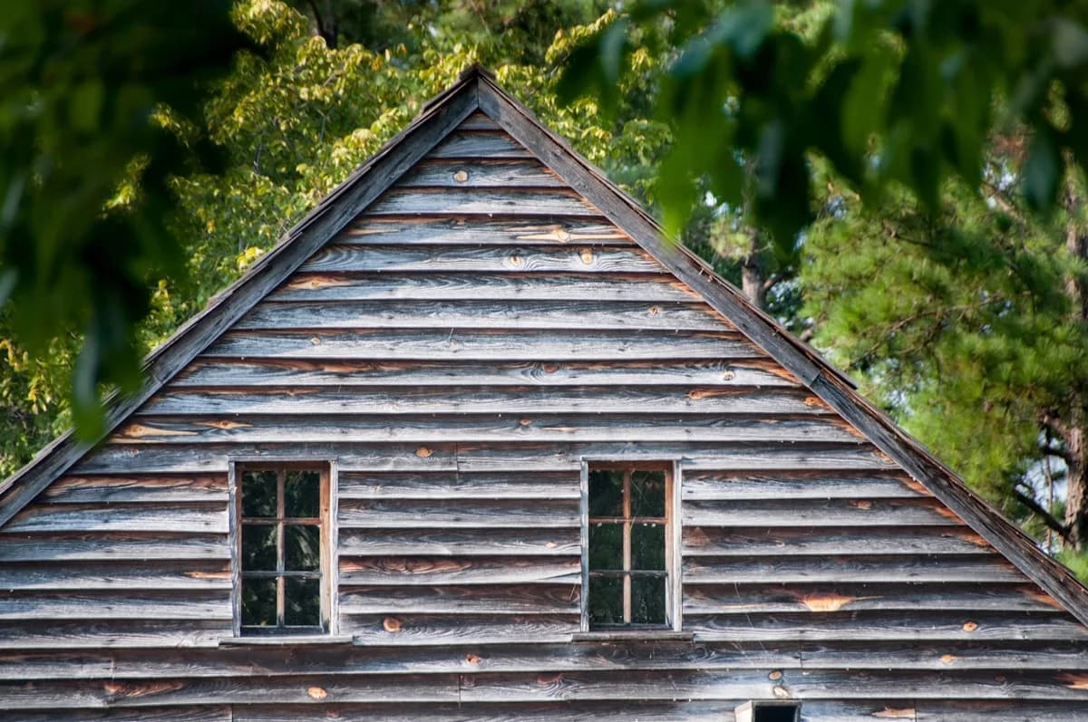 Weathered wooden house before re-siding